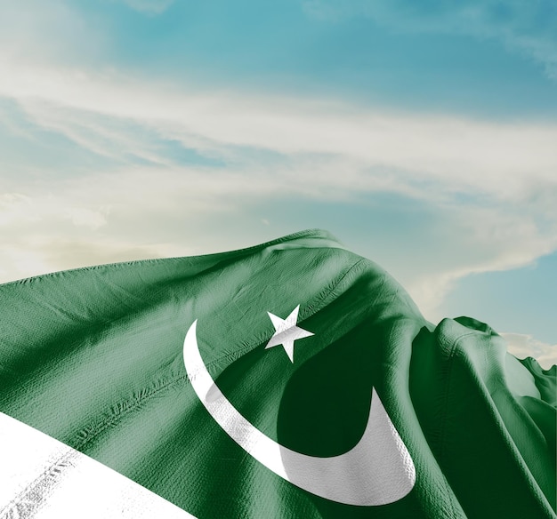 Foto bandera de pakistán ondeando en un hermoso cielo.