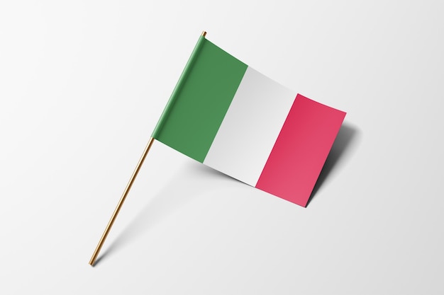 Bandera de papel pequeña de Italia sobre un fondo blanco