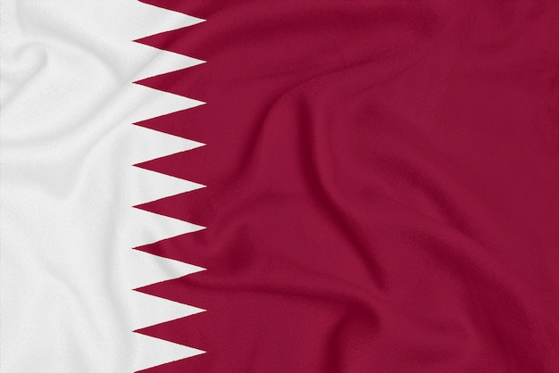 Foto bandera de qatar sobre tela con textura.