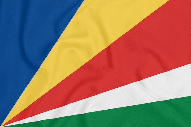 Foto bandera de seychelles en tela con textura.