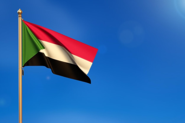 Foto bandera de sudán soplada por el viento con cielo azul en el fondo