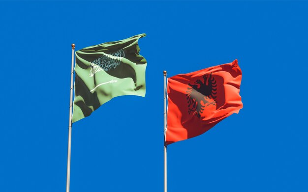 Banderas de Arabia Saudita y Albania. Ilustraciones 3D