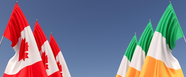 Banderas de Canadá e Irlanda en astas de bandera en los lados Banderas sobre un fondo azul Lugar para el texto Ilustración 3d irlandesa de Ottawa canadiense