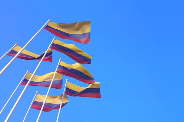 Banderas de colombia ondeando en el viento contra un cielo azul d renderizado