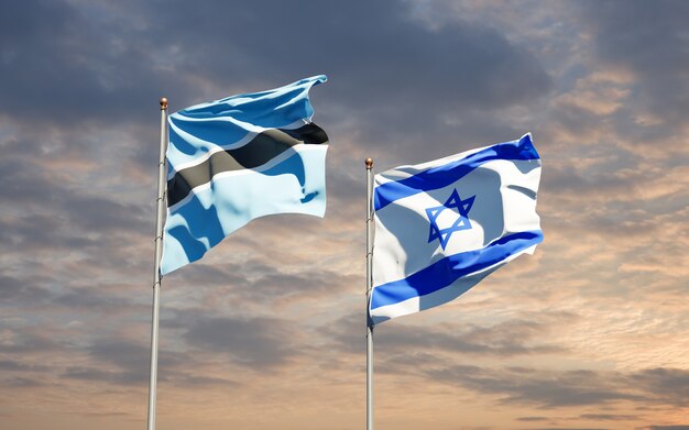 Banderas estatales de Israel y Botswana juntos en el fondo del cielo