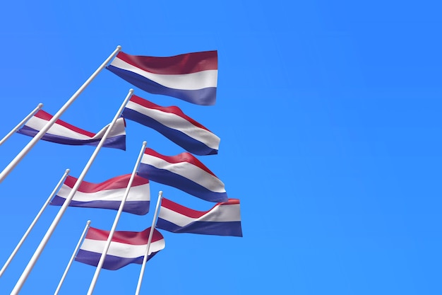 Banderas holandesas ondeando en el viento contra un cielo azul d renderizado