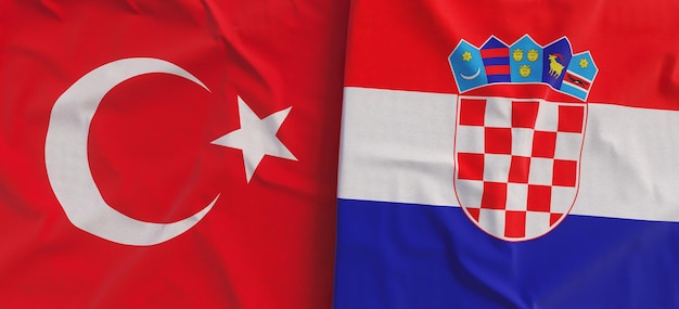 Banderas de Turquía y Croacia Primer plano de la bandera de lino Bandera hecha de lienzo Símbolos nacionales del estado turco de Ankara Zagreb Ilustración 3d