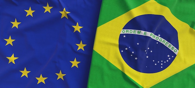 Banderas de la Unión Europea y Brasil Banderas de lino primer plano Bandera hecha de tela Símbolos nacionales brasileños de la UE Ilustración 3d