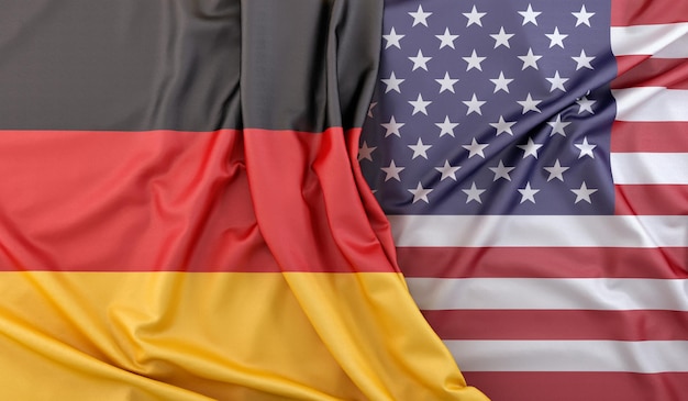 Banderas con volantes de Alemania y EE. UU. Representación 3D