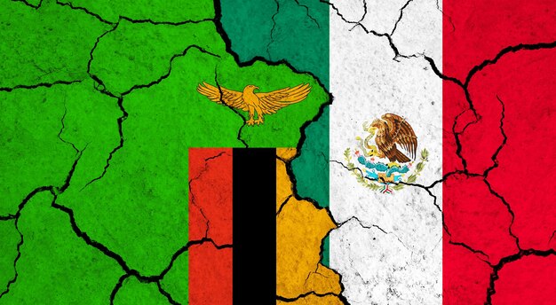 Las banderas de Zambia y México en la superficie agrietada del concepto de relación política