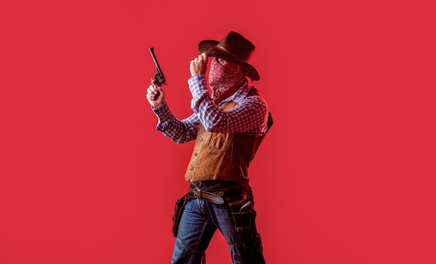 Bandido americano mascarado homem ocidental com chapéu Homem vestindo arma de chapéu de cowboy Armas ocidentais Cowboy americano Cowboy vestindo chapéu Vida ocidental Cara com chapéu de cowboy