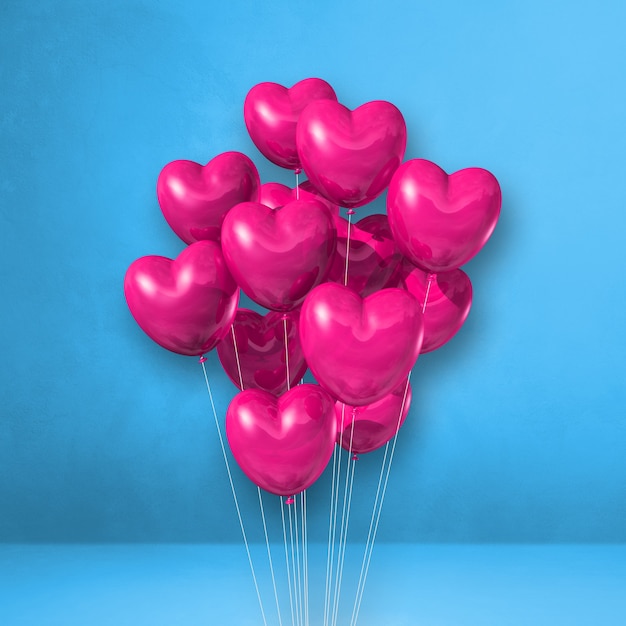 Foto bando de balões de forma de coração rosa em um fundo de parede azul. ilustração 3d render