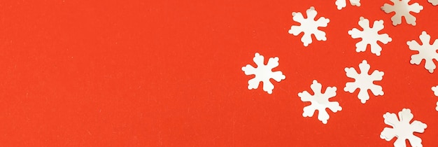 Banner con copos de nieve plateados