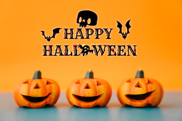 Foto banner de halloween com abóboras esculpidas