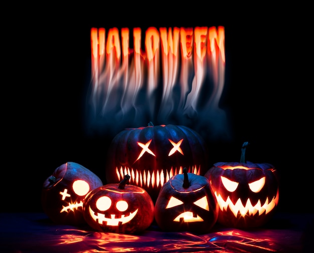 Foto banner de halloween com abóboras iluminadas