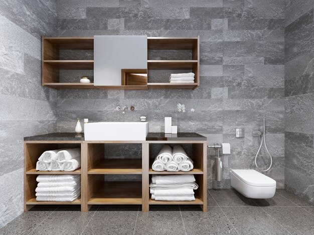 Baño de estilo contemporáneo con pared de azulejos de piedra gris.