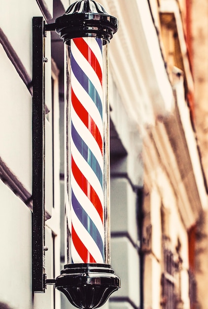 Barber Shop Pole Logo des Barbershop-Symbols Barbershop Pole Retro Old fashioned vintage Barber Shop Pole Ein klassisches Barber-Logo