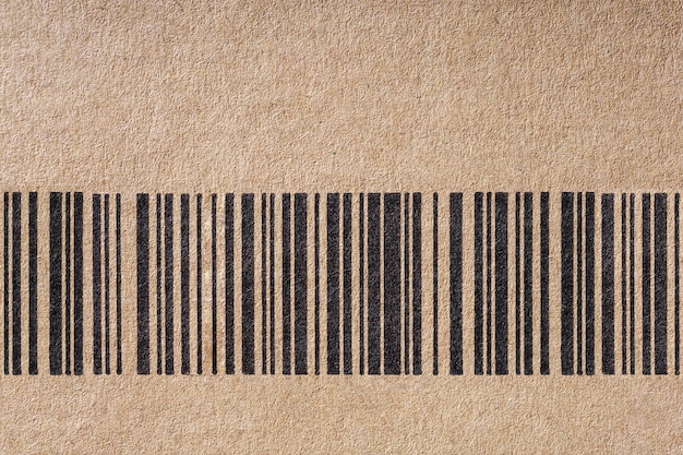 Foto barcode-symbol auf karton moderner einfacher flacher barcode auf kartonpapier