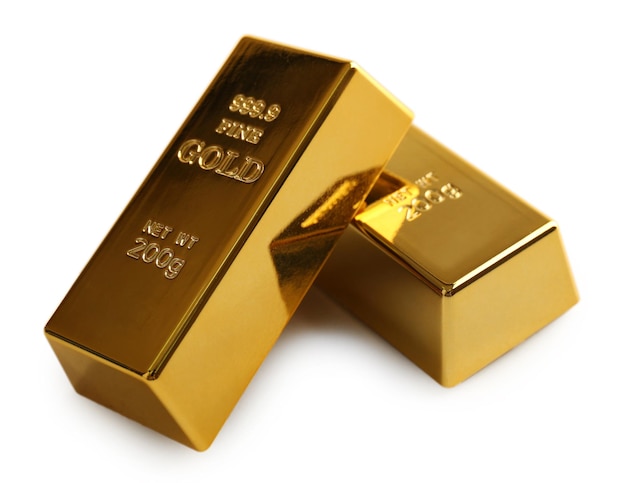Barras de oro aisladas en blanco