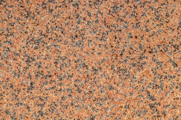 Base vermelha de textura de granito com manchas pretas e cinzas