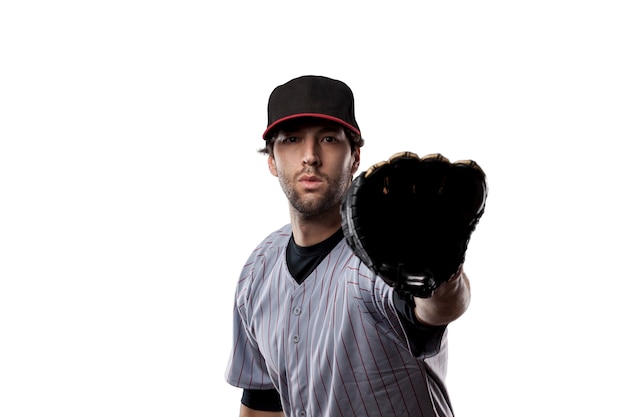 Foto baseballspieler in der roten uniform, auf einem weißen hintergrund.