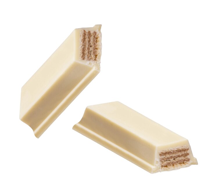 Foto bastões de chocolate branco isolados em fundo branco