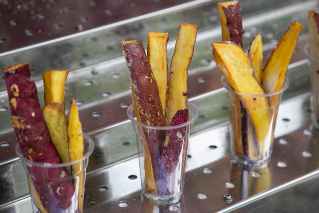 Foto batatas doces japonesas yaki imo em uma barraca de comida de rua em kyoto