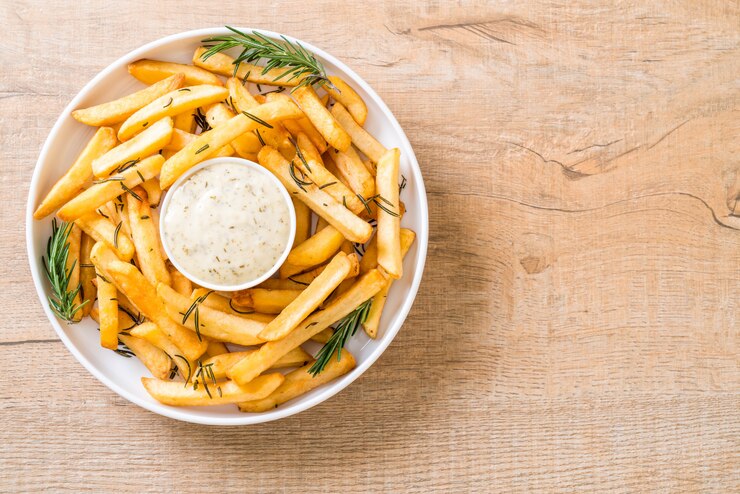 Foto batatas fritas com molho
