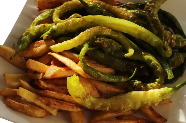 Batatas fritas e pimentas Fundo de comida