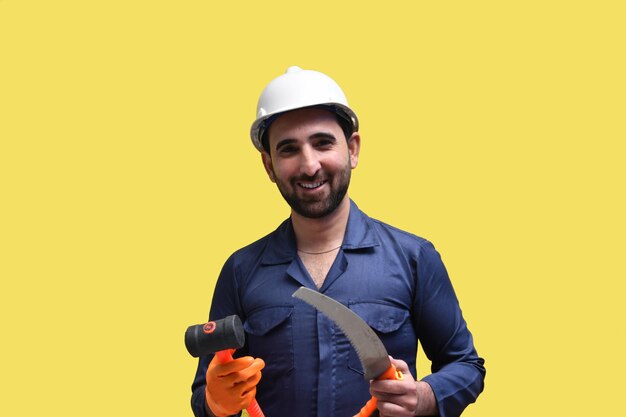 Bauarbeiter mit Hammer und Handsäge indisches pakistanisches Modell