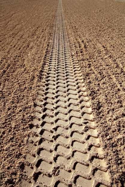 Beach Sand-Reifen Fußabdruck Perspektive unendlich