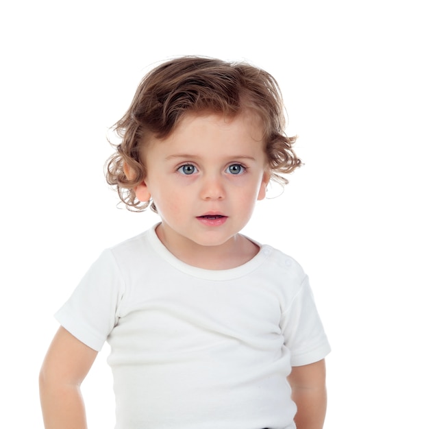 Bebé adorable con el pelo rizado aislado