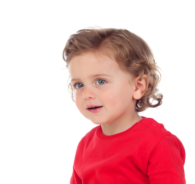 Bebé adorable con el pelo rizado