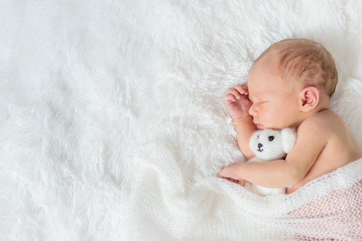 Foto bebê recém-nascido dormindo