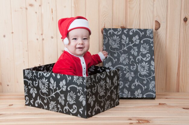 bebe con ropa de santa claus