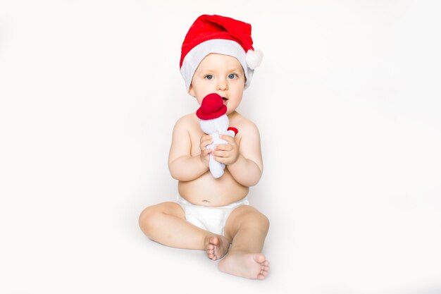 bebê usando chapéu de papai noel