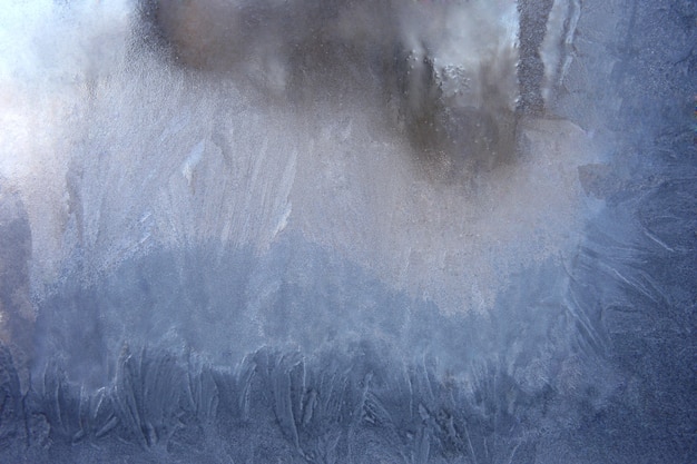 Bedeckt mit gefrorenem Eisfensterglas