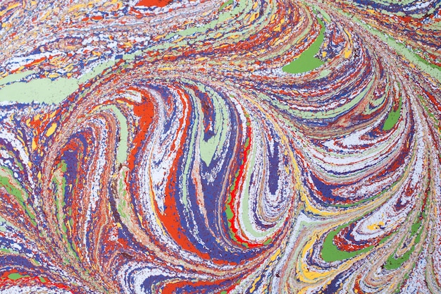 Bela arte abstrata de técnicas de pintura de mármore Ebru na água com tintas