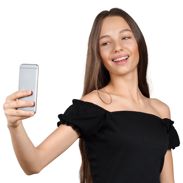 Foto bela jovem está fazendo selfie foto com smartphone