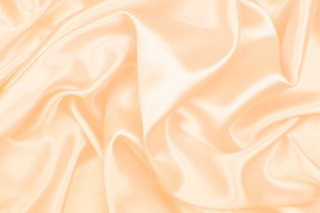 Bela textura de seda creme luxuoso cetim para abstrato