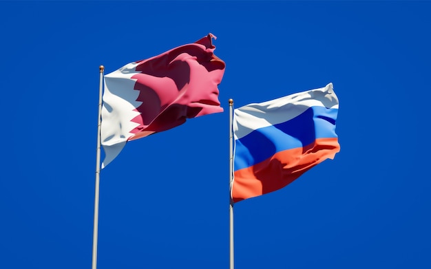 Belas bandeiras do estado nacional do Qatar e da Rússia juntos no céu azul. Arte 3D