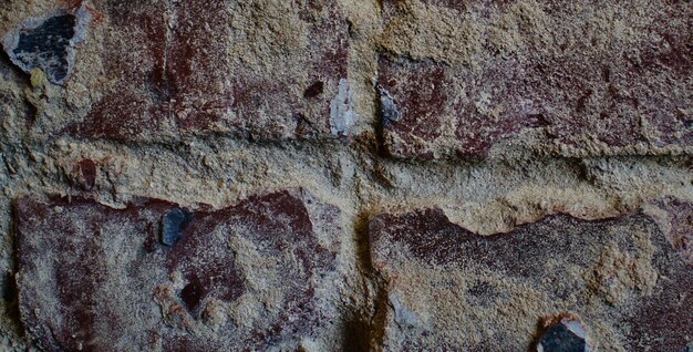 Belleza atemporal Una fotografía que muestra una impresionante pared de cemento con textura vintage