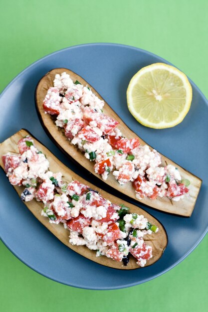 Berenjenas al horno con hierbas de tomate y requesón