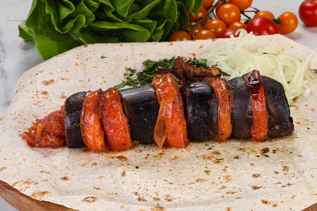 Foto berenjenas al horno con tomate