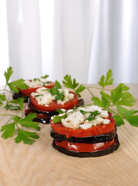 Berenjenas asadas con tomate y ricotta