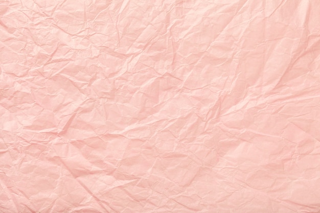 Beschaffenheit des zerknitterten rosa Packpapiers