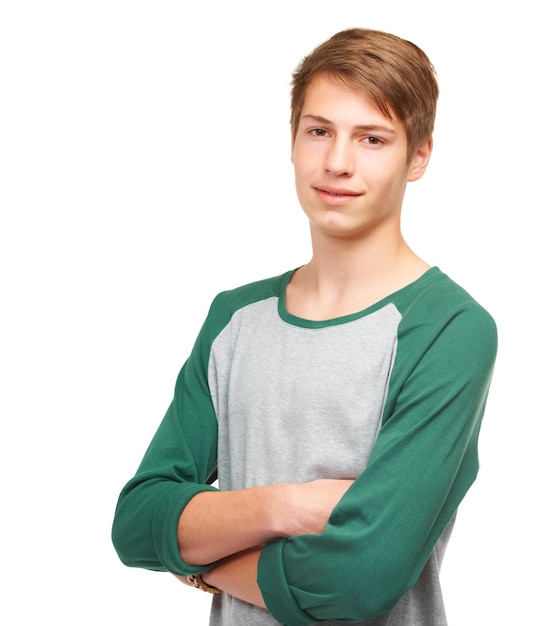 Besitzer dieses Fotoshootings Ein hübscher junger Teenager, der selbstbewusst in einem Studio steht