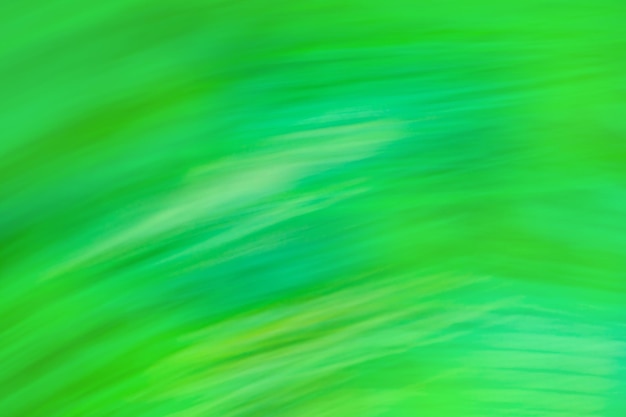 Bewegung verwischt defocused abstrakter grüner Hintergrund Grüne abstrakte defocused Bewegung verwischter Hintergrund
