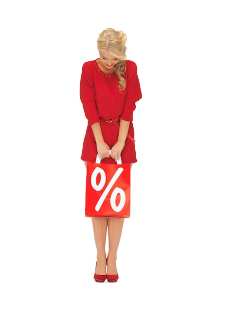 Bild der schönen Frau im roten Kleid mit Einkaufstasche