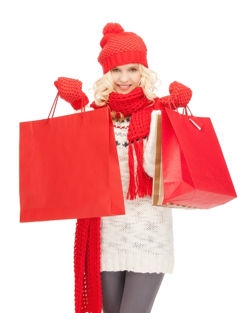 Bild des jungen Mädchens mit Einkaufstüten..